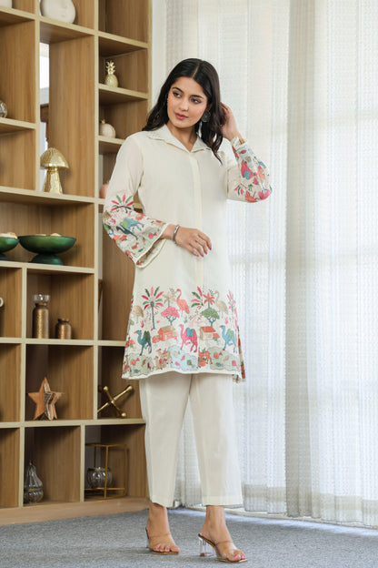 Woman wearing ivory color multi color embroided cotton coord set